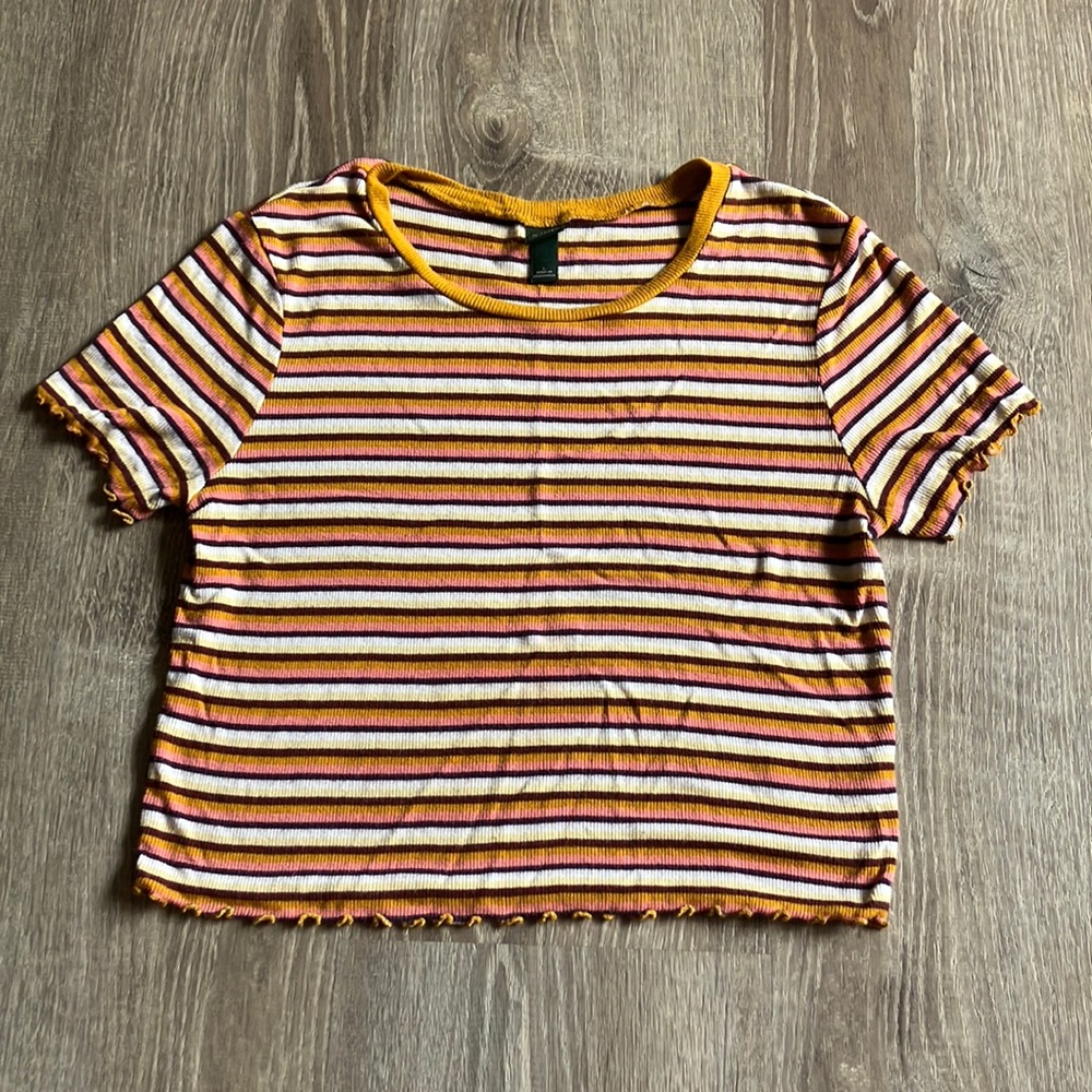 Yellow, brown, beige, white, pink, striped t-shirt. Size large from target.